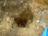 Lower center post hole