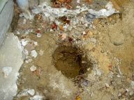 Upper center post hole